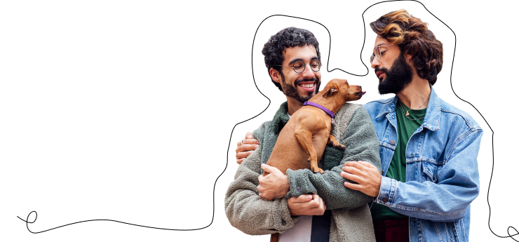 Two men holding a dog